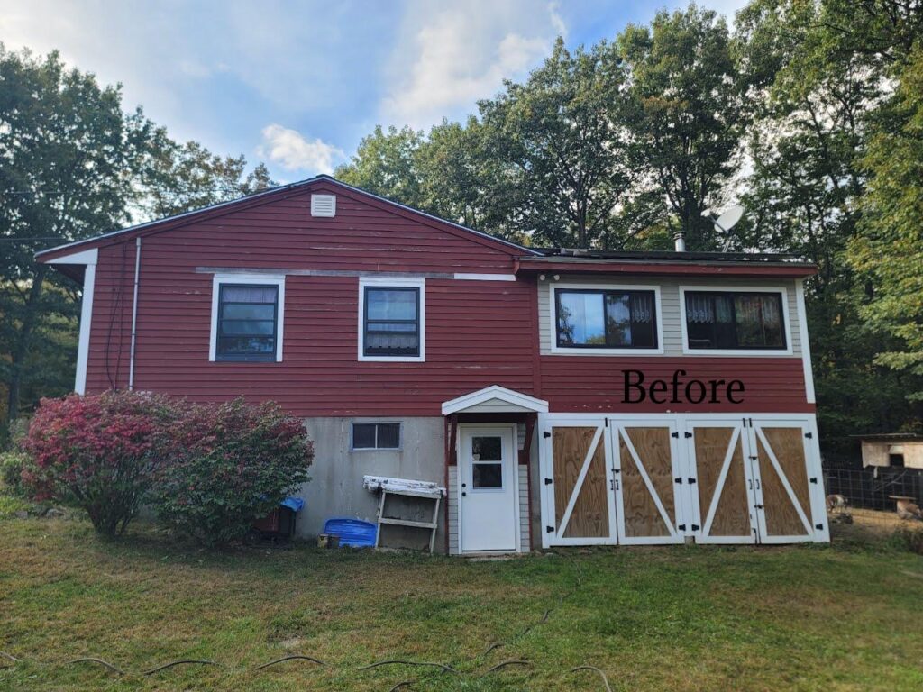 A New England home with mismatched paint, unpainted doors, and chipped, peeling exterior before restoration by Impeccable Painting.
